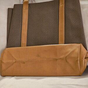 vintage tote with surface interest and leather trim